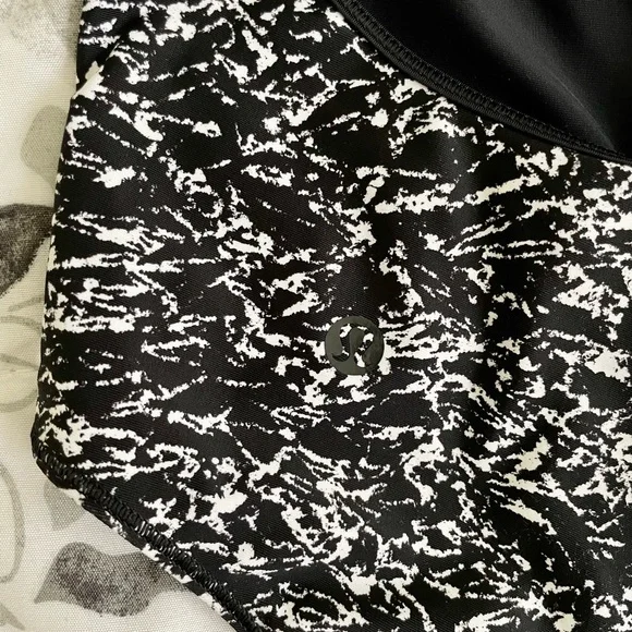 Rare LIKE NEW Lululemon cutout one piece swim suit with tie detail in back. - Picture 5 of 5